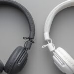 white and black wired stereo headphones on gray ba 2023 11 27 05 22 10 utc (2)