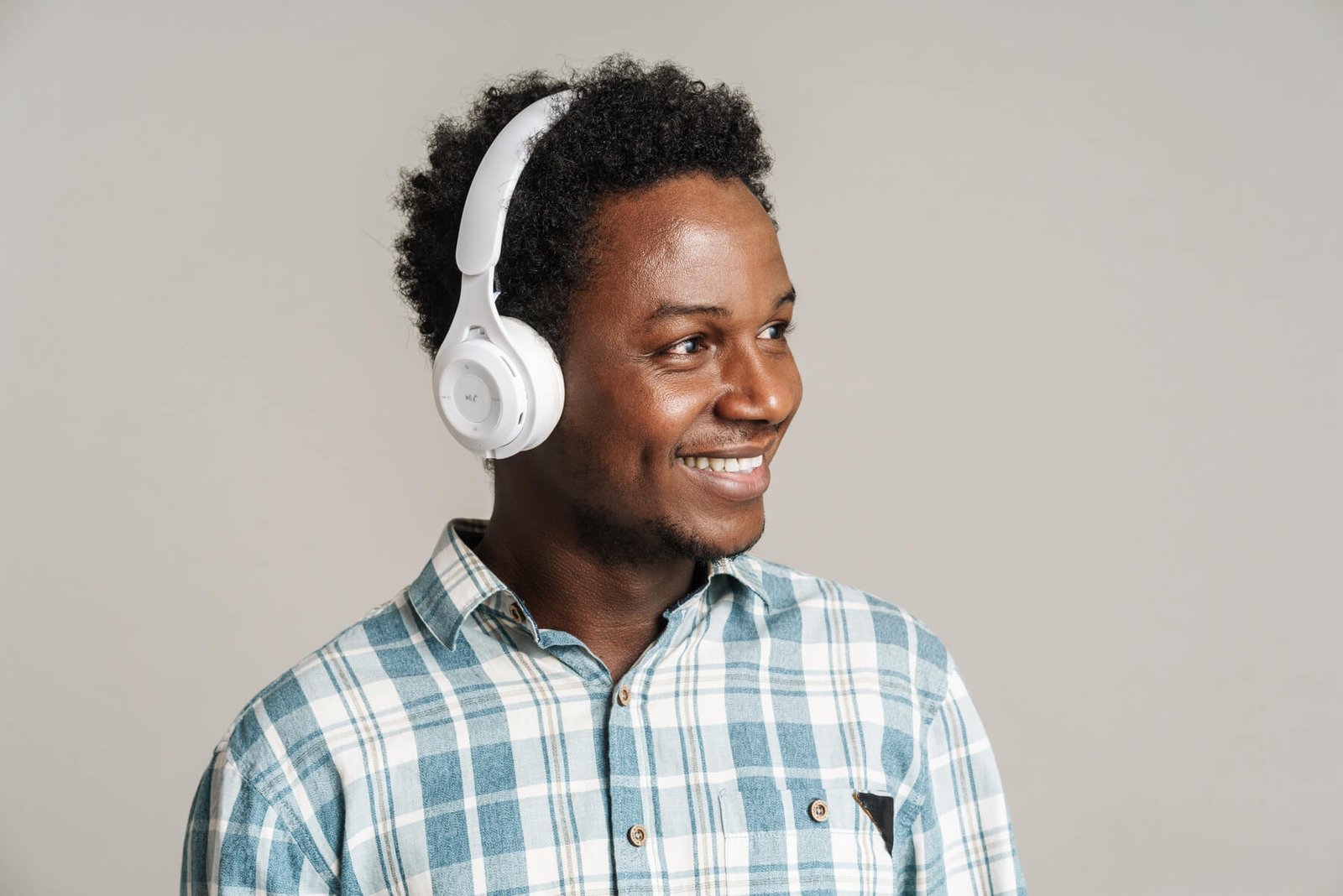 young black man smiling while listening music with 2023 11 27 05 10 41 utc.jpg